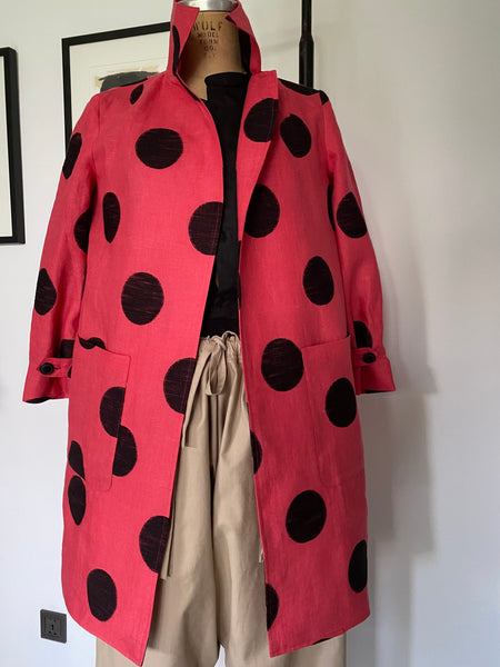 EXCLUSIVE: SHADES OF RED TRAVEL COAT